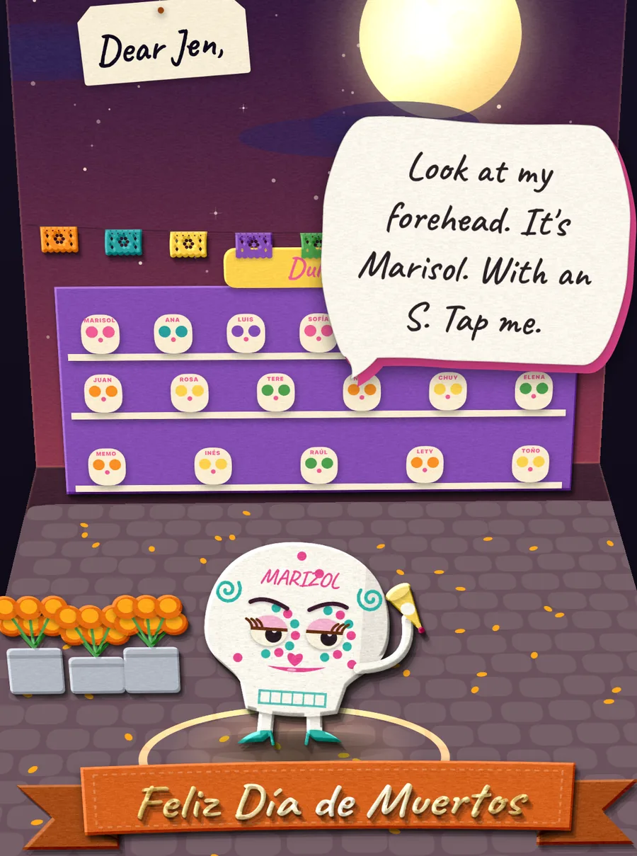 Sugar Skull Sol's card for D&iacute;a de Muertos, set in a candy stall of sugar skulls.